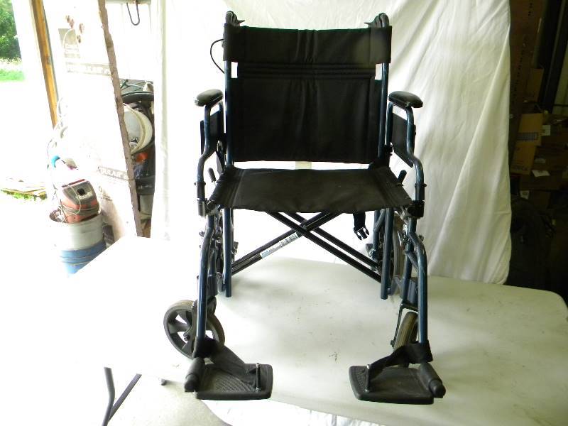 lot 122 image: Transporter Wheelchair