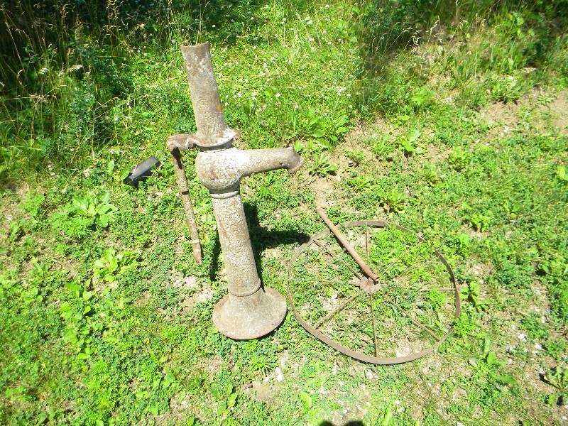lot 439 image: Vintage Wheel and Water Pump Lot