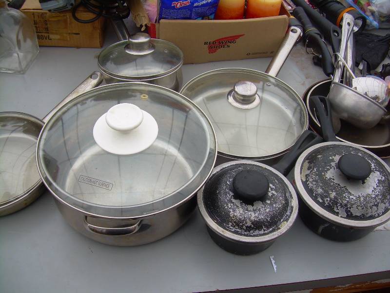 lot 56 image: STAINLESS POTS AND PANS