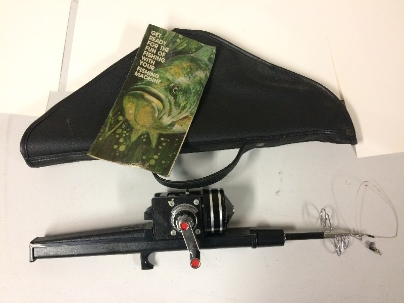 lot 18 image: One Piece Rod & Reel in Case - Fishing Machine