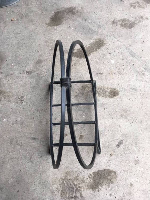lot 6 image: CAST IRON FIREWOOD HOLDER