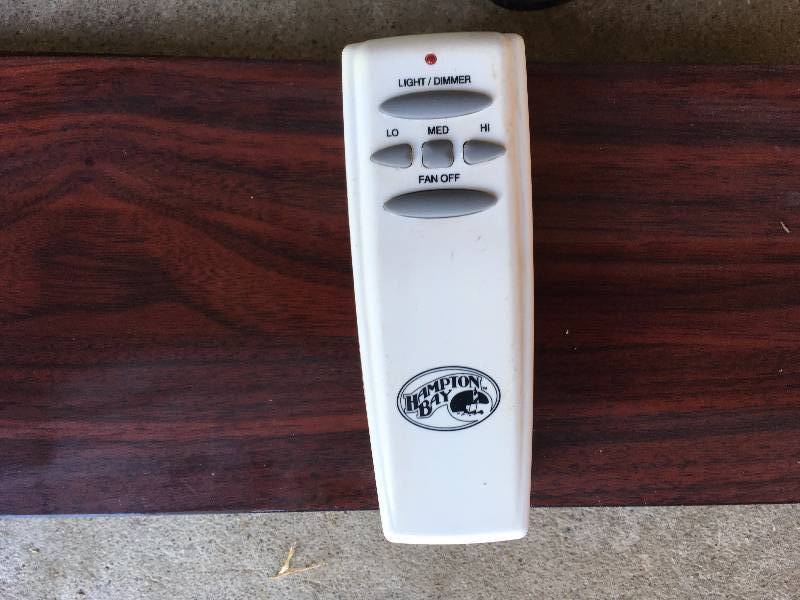 lot 56 image: (2) HAMPTON BAY CEILING FANS AND REMOTES
