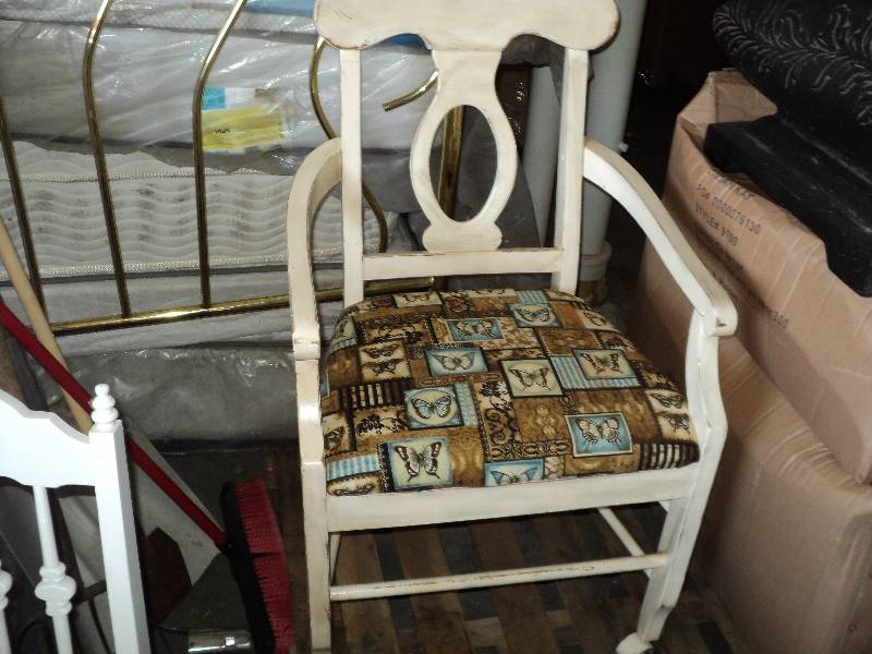 upholstered chair on wheels...