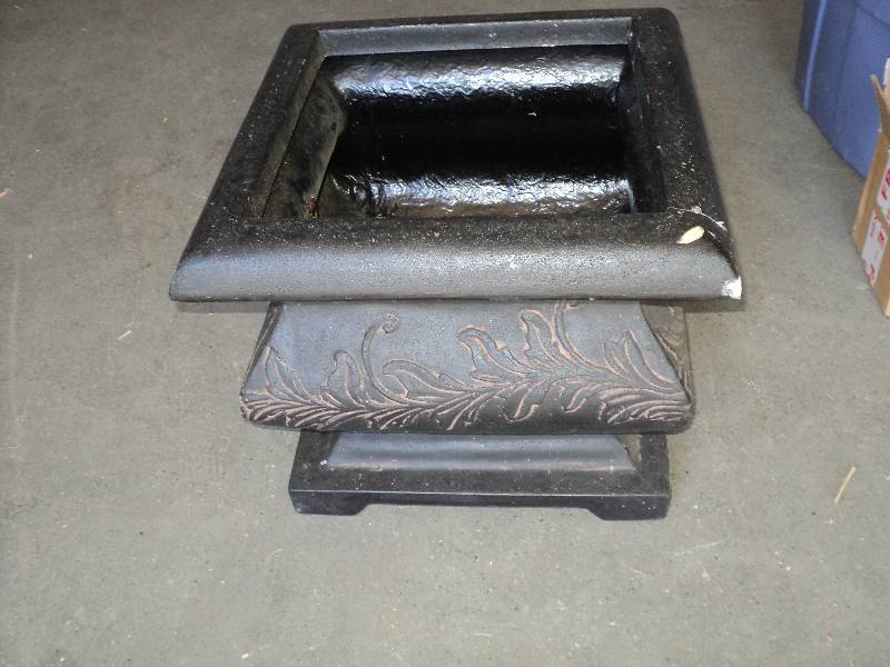 black planter ( damaged) 18in tall,...