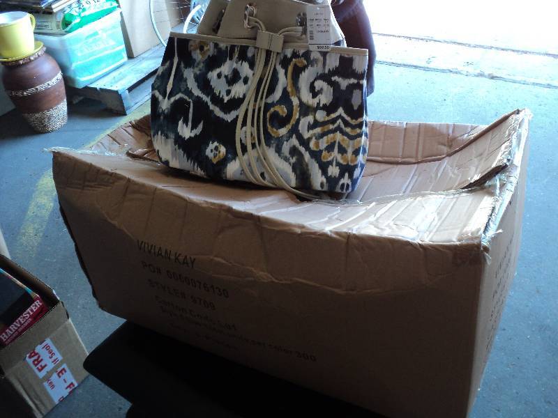 box of 8 blue new purses...