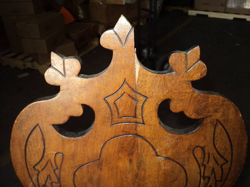 ornate carved chair, damaged on top...