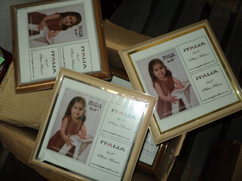 box of 35 8x8 picture frames...
