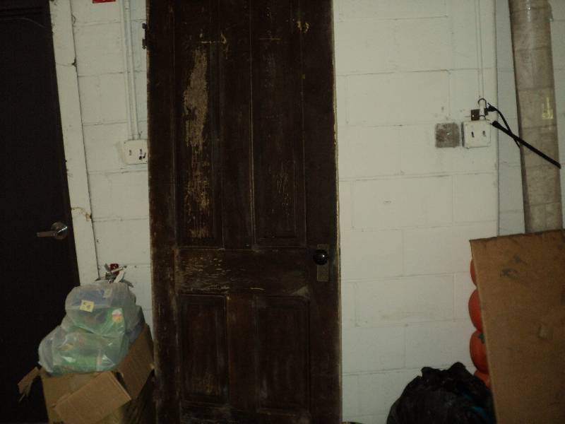 inside wooden door with doorknob, 5...