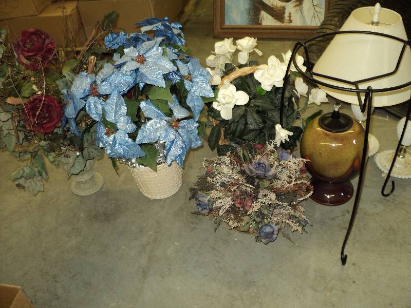 artificial flowers and plantstand a...