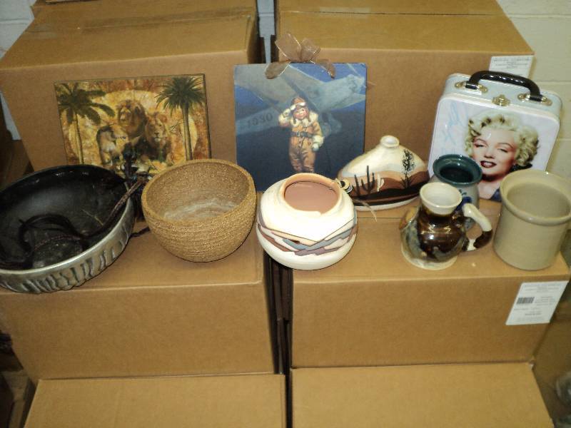 box of pottery and Marilyn Monroe l...