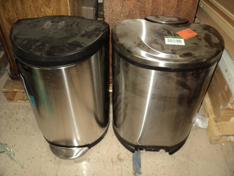 2 garbage cans, both damages and 20...