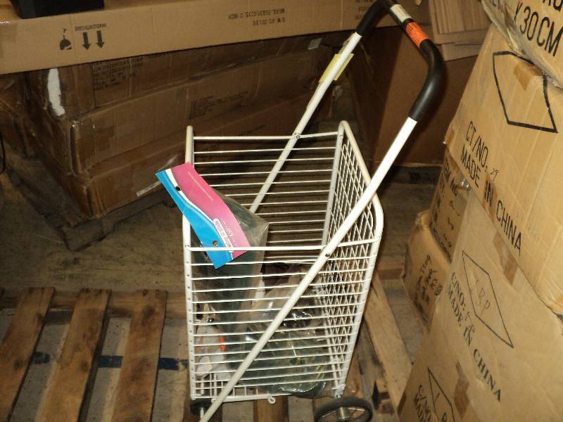 grocery cart with misc. and swing s...
