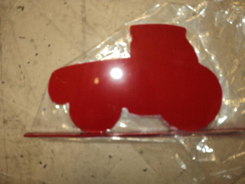 3 red tractors...