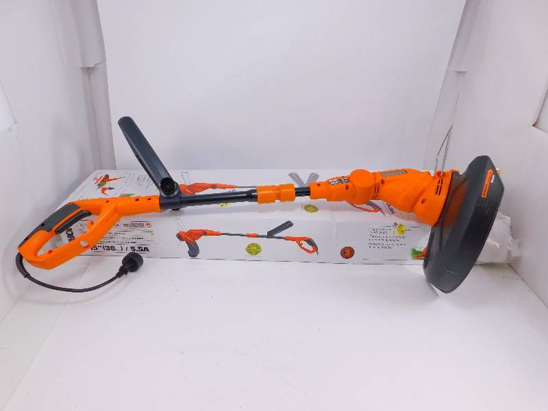 lot 29 image: Worx 5.5 Amp 15 in. Straight Shaft Grass Trimmer