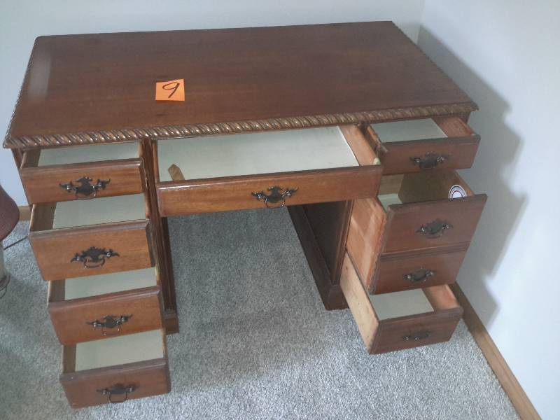 Antique Desk.. Looks like it is Mahogany wood