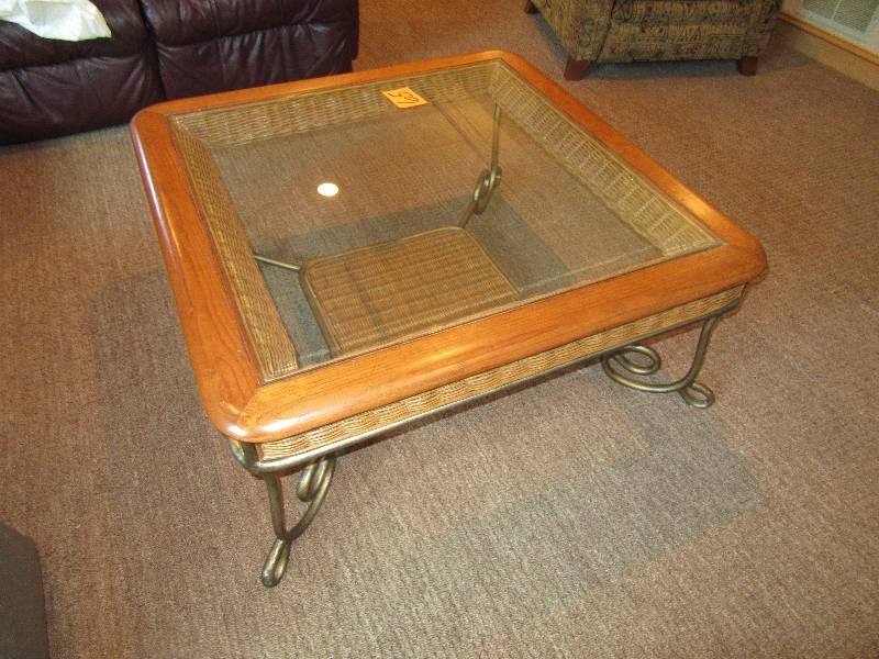Coffee Table Nice wood and Glass with Wicker EdgingAccents. Wicker Shelf