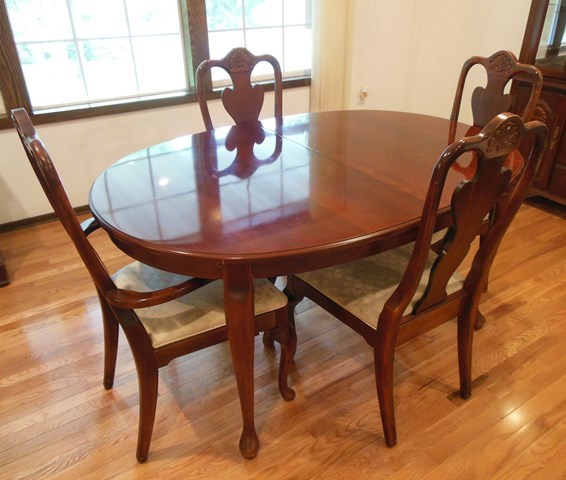lot 30 image: Dining Table with Leaf and Four Chairs - Please take note of damage (Matches China Hutch, Small Buffet, and Bedroom Dresser)