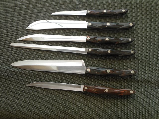 Cutco 12” serrated knife, #1729 KE. - Northern Kentucky Auction, LLC