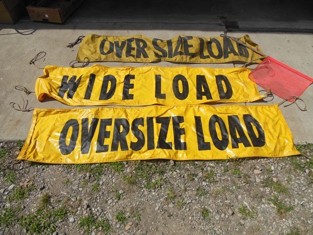 lot 139 image: 2 Vinyl Dual-Sided Wide Load Signs, 1 Oversize Load Mesh, and 1 Flag