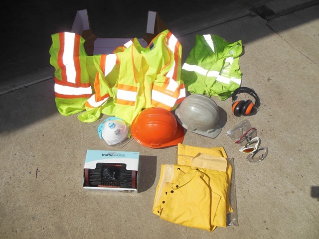 lot 141 image: XL and 23XL Safety Vests, 2 Hard Hats, New N95 42CFR 84-part. 5-Pack Respirator, New Traffic Master Boot Scraper, Rain Gear Size Large, Glasses, and Ear Protection