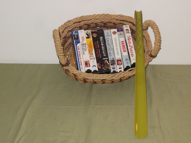 lot 278 image: Basket with VHS Movies and Long Shoe Horn