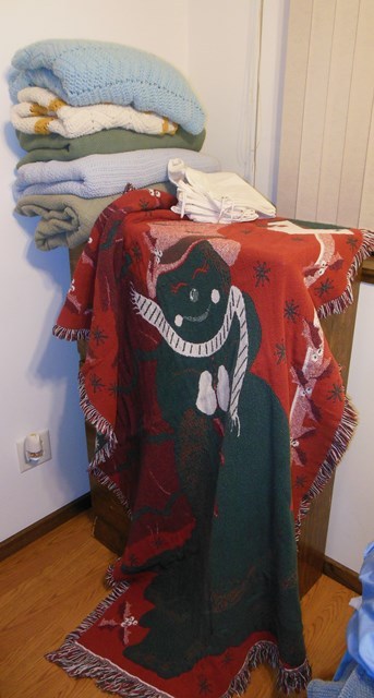 lot 300 image: Extra Thick Winter Throw Blanket, Laundry Bags, and Various Throws