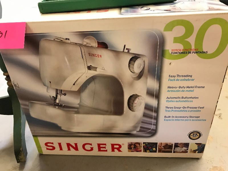 lot 201 image: SEWING MACHINE AND NOTIONS