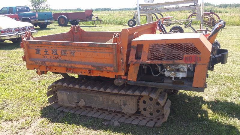 lot 4 image: Kubota 3-Way Dump Truck (See Video)