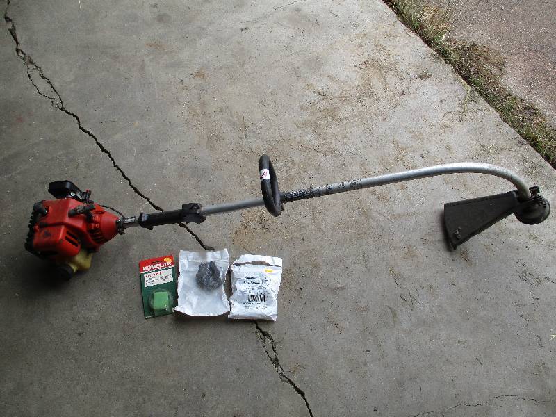 lot 64 image: Homelite weed whip