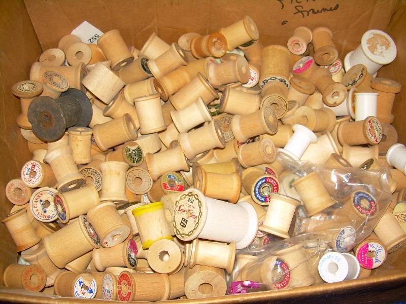 BOX OF WOODEN THREAD SPOOLS