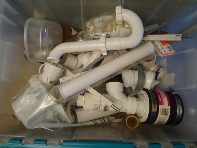 lot 7 image: Bin Full Of Misc Plumbing Supplies