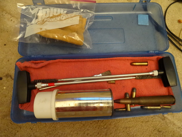 lot 57 image: Gun Cleaning Kit With Misc Bullets