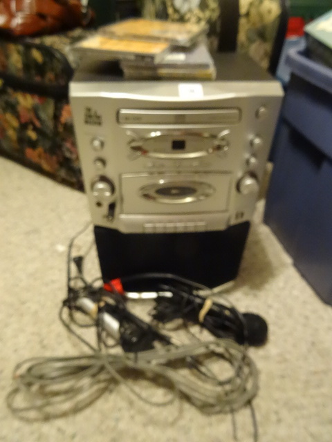 lot 136 image: The Singing Machine Karaoke Set,