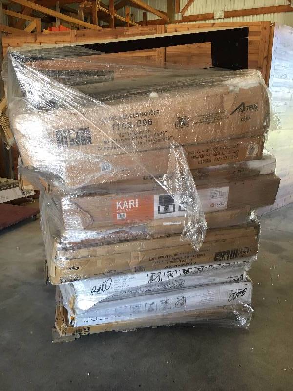 lot 54 image: Pallet of TV Mounts, Entertainment Center, Etc.
