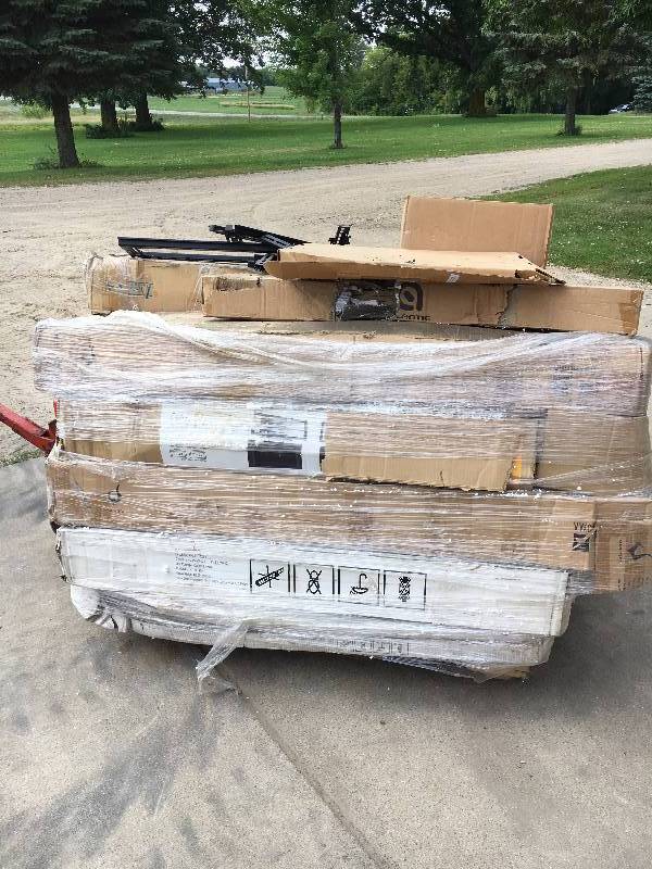 lot 136 image: Pallet of TV Stands, Entertainment Stands, Etc.