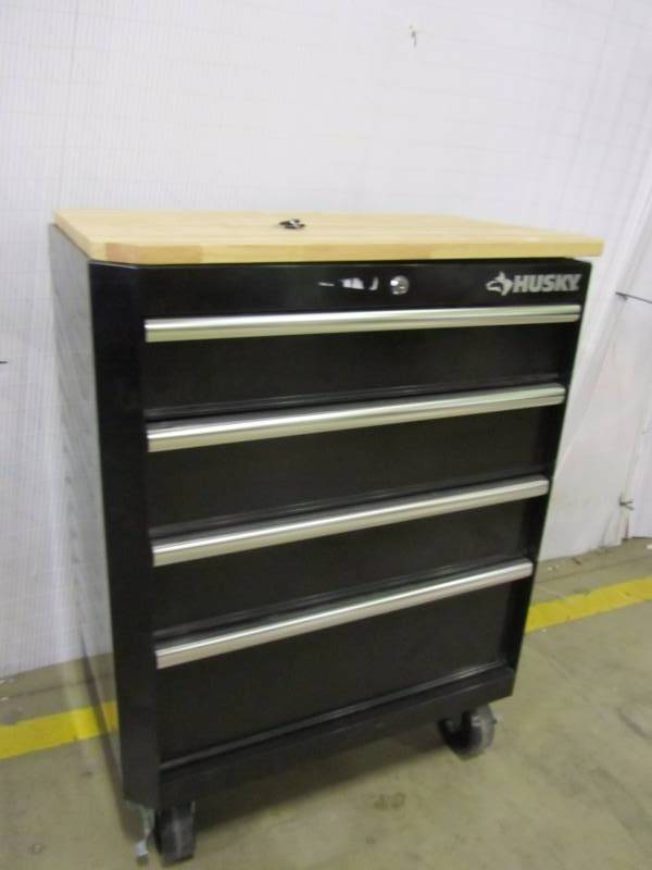 lot 57 image: Husky 33 in. H x 28 in. W x 18 in. D 4 Drawer Steel Garage Base Cabinet