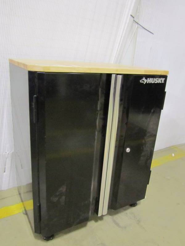 lot 58 image: Husky 32 in. H x 28 in. W x 18 in. D Steel 2-Door Garage Base Cabinet