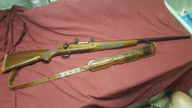 lot 4 image: Wincester Model 70 Alaskan, 375 H&H Mag Rifle with Scope Rings