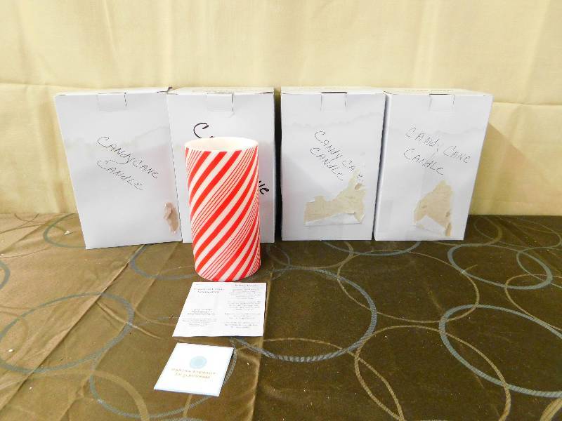 lot 447 image: 4 CANDY CANE CANDLES