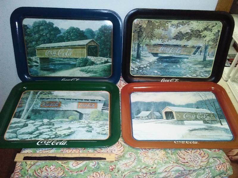 lot 7 image: Coca Cola Lap Trays (4) Depicts four seasons, 13 in. x 17.5 in.
