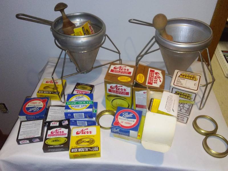 lot 53 image: Huge Canning Lot See Pictures, Sieves (2), Several boxes of seals and rings (reg. and wide) Variety of Jars (29)