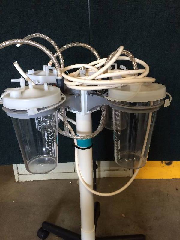 lot 58 image: WOW $$$ MEDI-VAC SUCTION 4 CANISTER SYSTEM WROLLING CART - Super Condition - Hoses Need Replacement or Cleaning