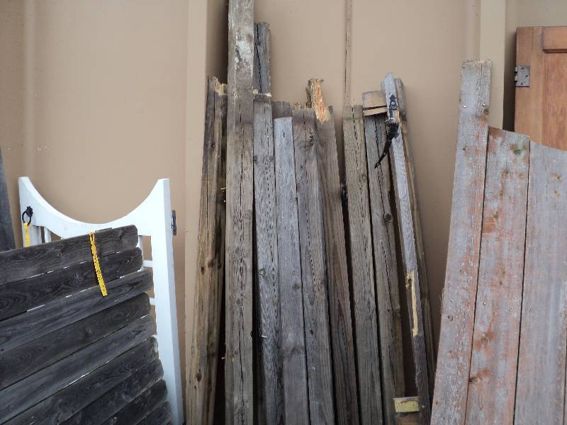 13 fence posts, various lengths...