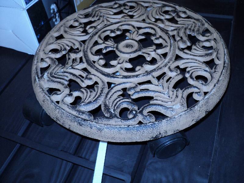 cast iron plant caddy...