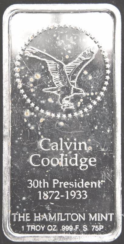 lot 12 image: 1 TROY OZ. .999 FINE SILVER BAR CALVIN COOLIDGE ART BAR