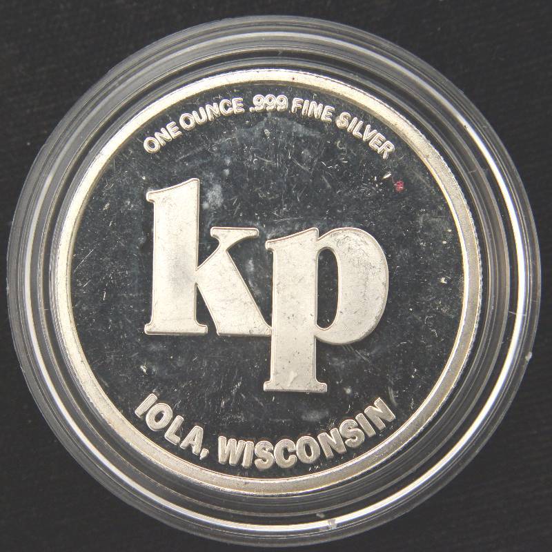 lot 27 image: 1 TROY OZ. .999 FINE SILVER WISCONSIN NUMISMATIC NEWS IN AIRTITE HOLDER