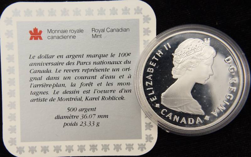 lot 34 image: 1985 CANADA NATIONAL PARKS MOOSE SILVER DOLLAR IN BLACK BOX