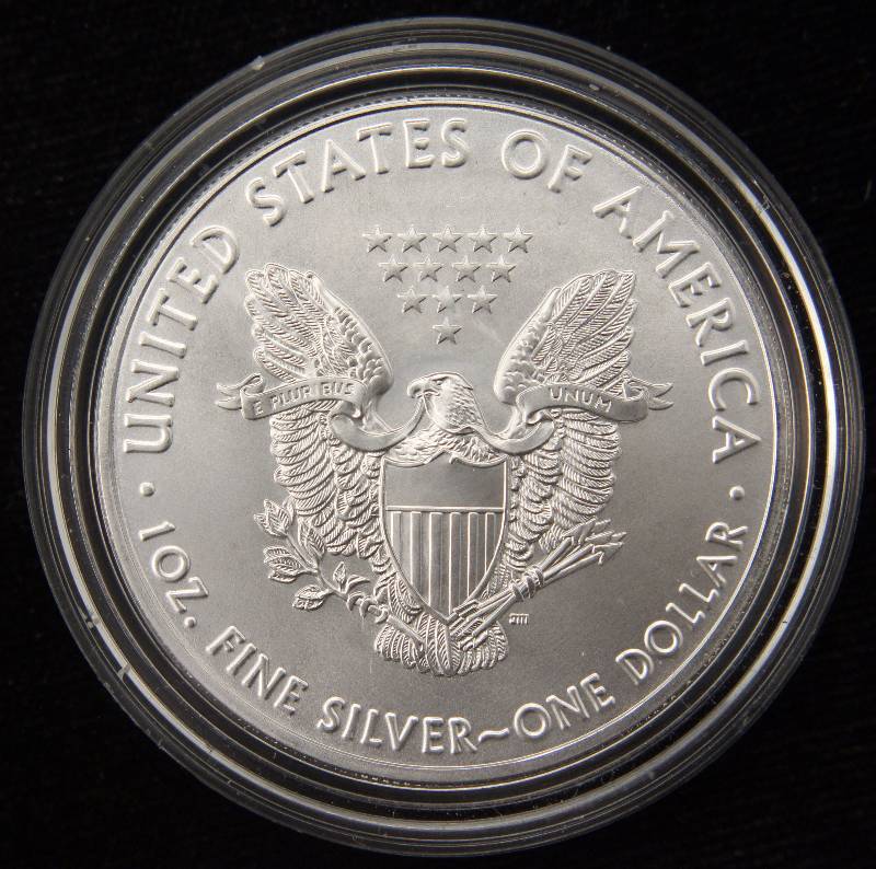 lot 35 image: 2016 AMERICAN SILVER EAGLE 1 TROY OZ. .999 FINE SILVER DOLLAR IN AIRTITE HOLDER