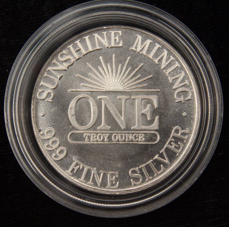 lot 51 image: 1 TROY OZ. .999 FINE SILVER SUNSHINE MINTING IN AIRTITE HOLDER