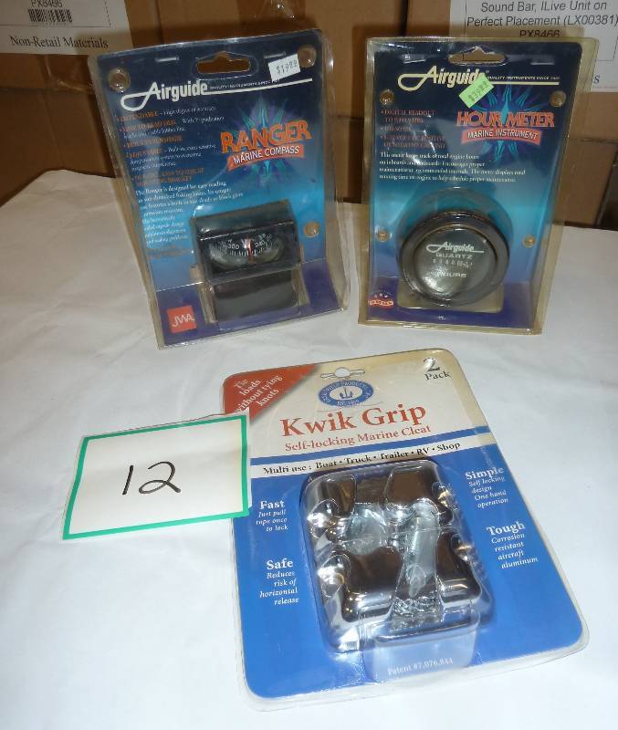 lot 12 image: Boat compass, hour meter and cleats...